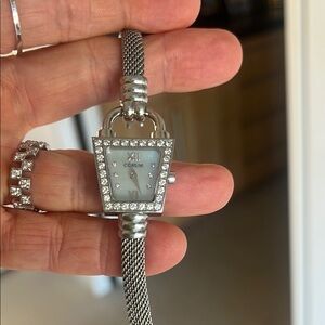 Women’s diamond Corum padlock watch